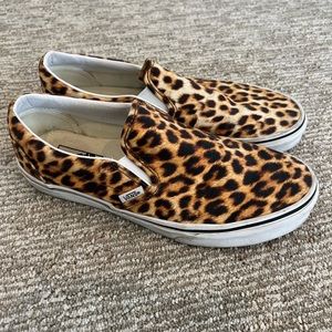 Leopard and white slip on Vans